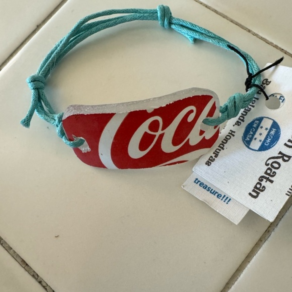 Adjustable recycled Coca-Cola bracelet made on Roatan Honduras. one of a kind.